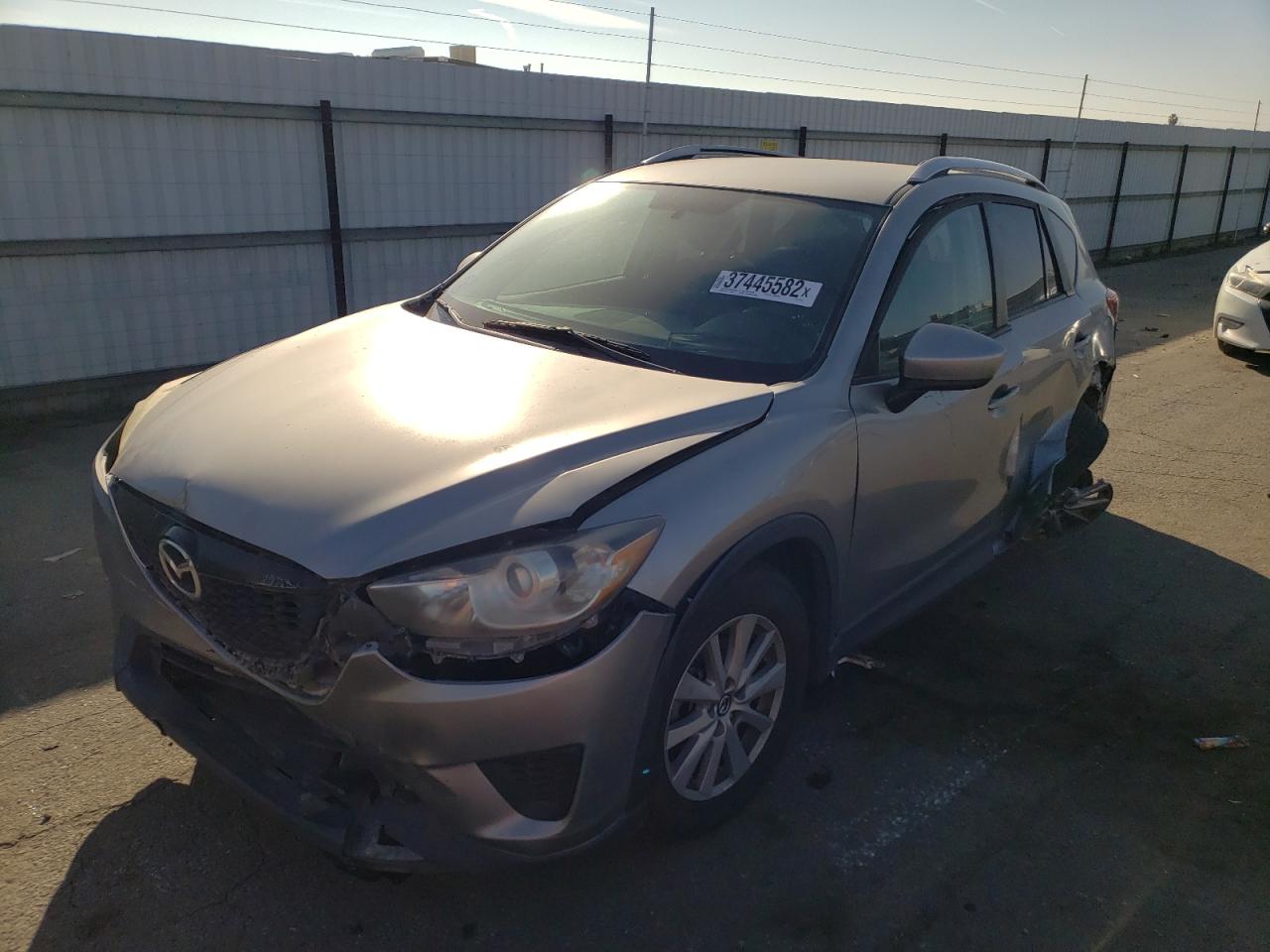 Photo 2 from auction – 2013 MAZDA CX-5 SPORT with VIN JM3KE2BE0D0143137
