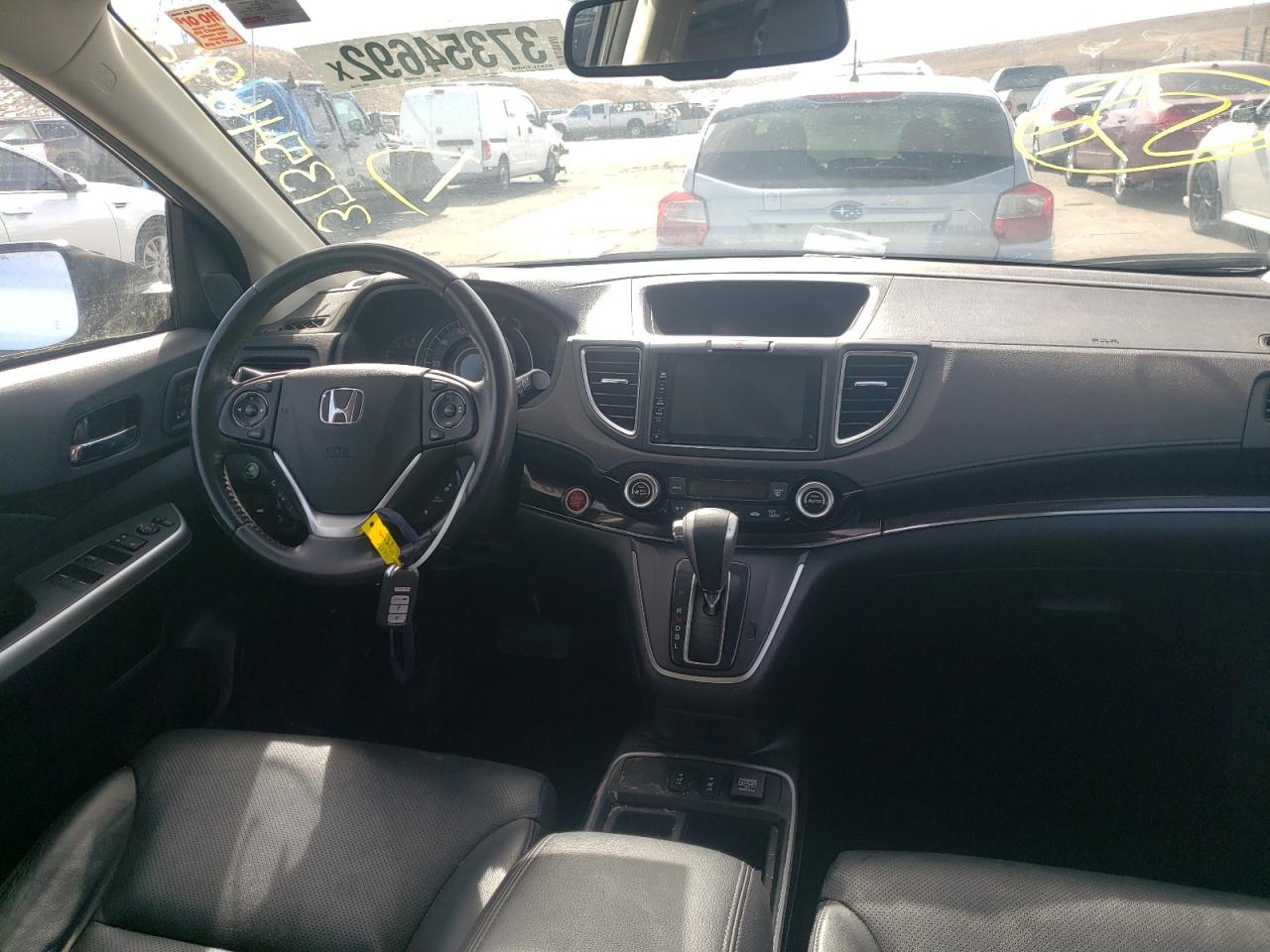 Photo 9 from auction – 2016 HONDA CR-V TOURI with VIN 5J6RM4H96GL011366