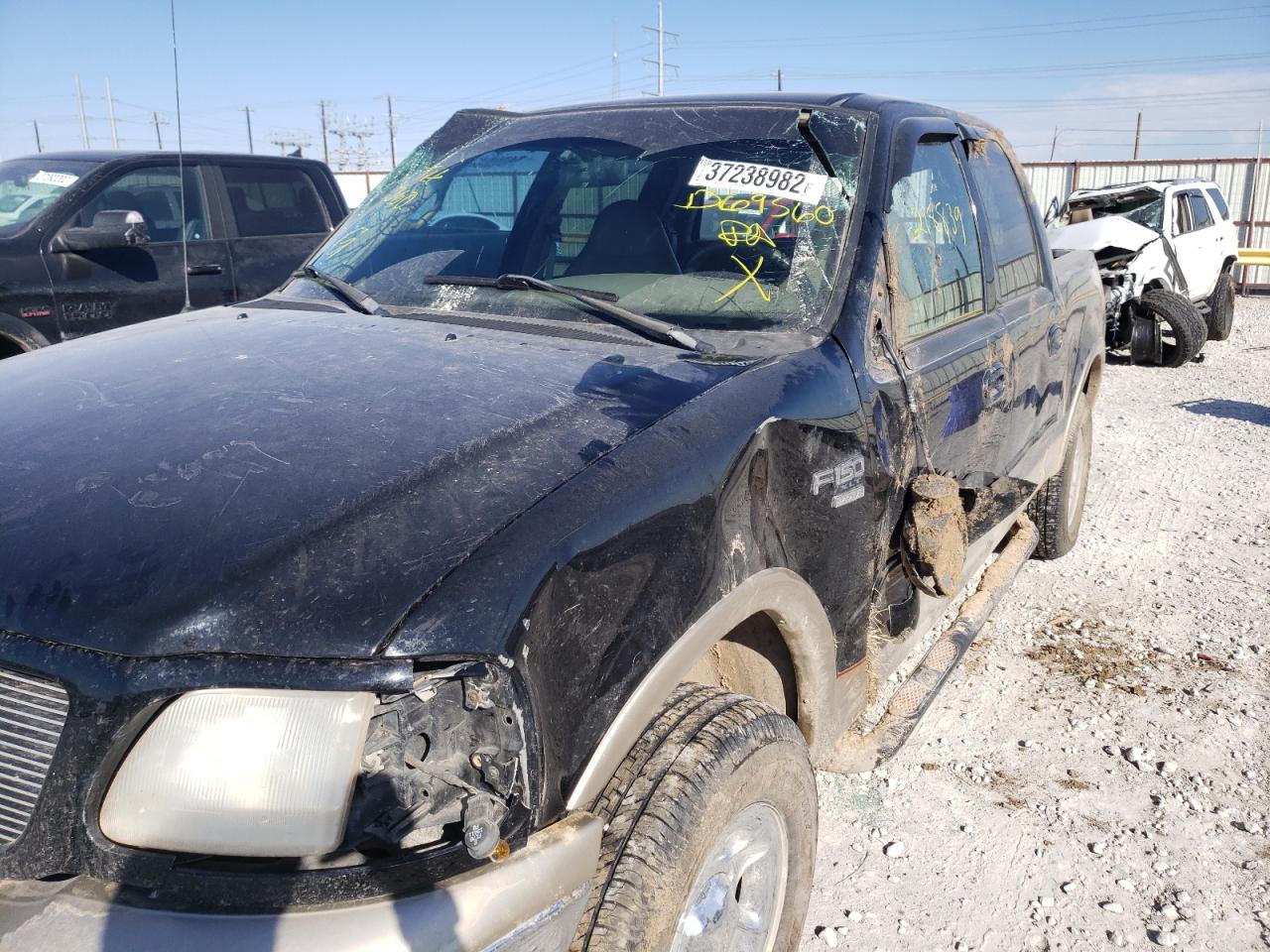 Photo 9 from auction – 2001 FORD F150 SUPER with VIN 1FTRW08L31KD69560