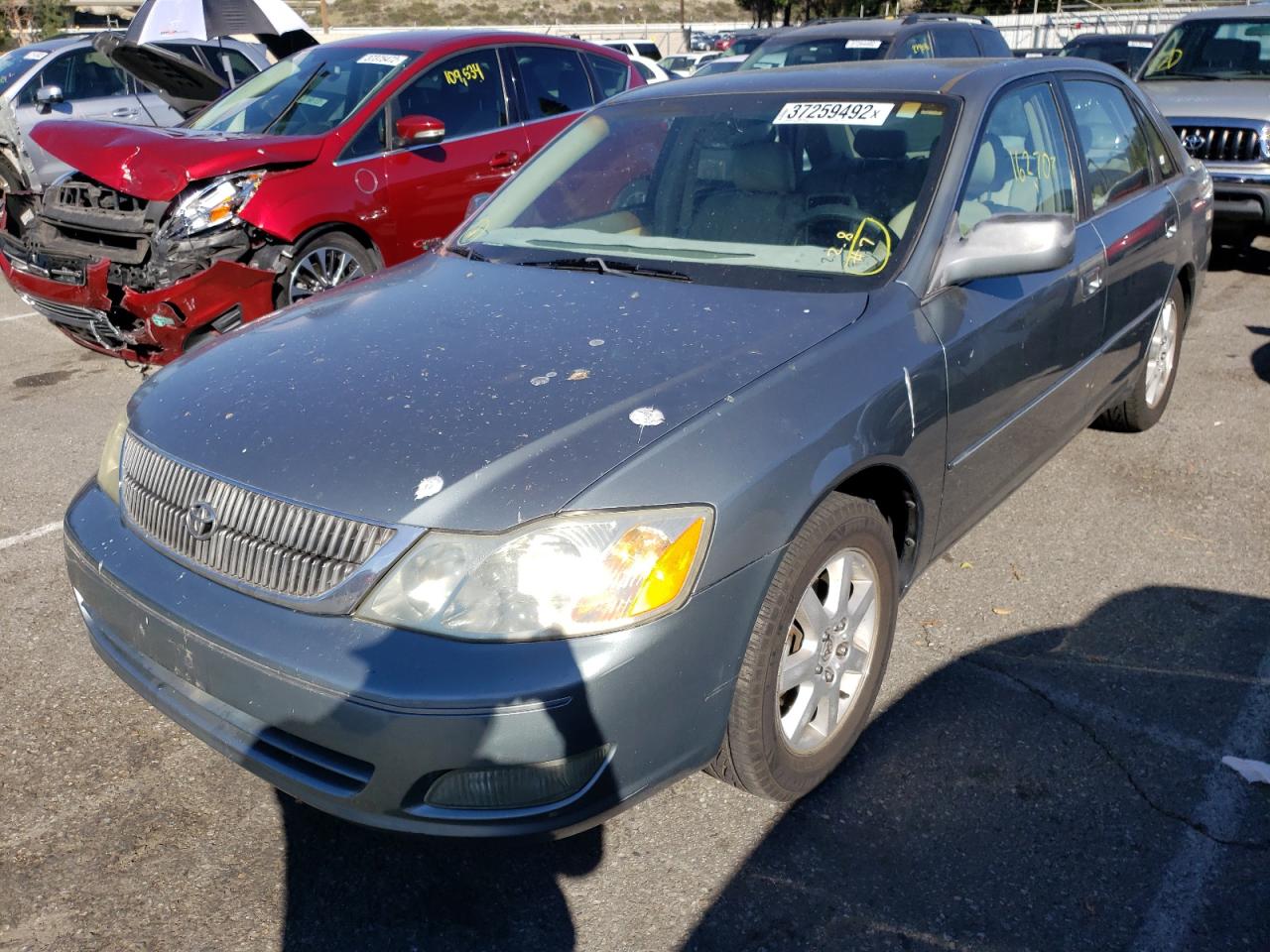 Photo 2 from auction – 2002 TOYOTA AVALON XL with VIN 4T1BF28BX2U253049