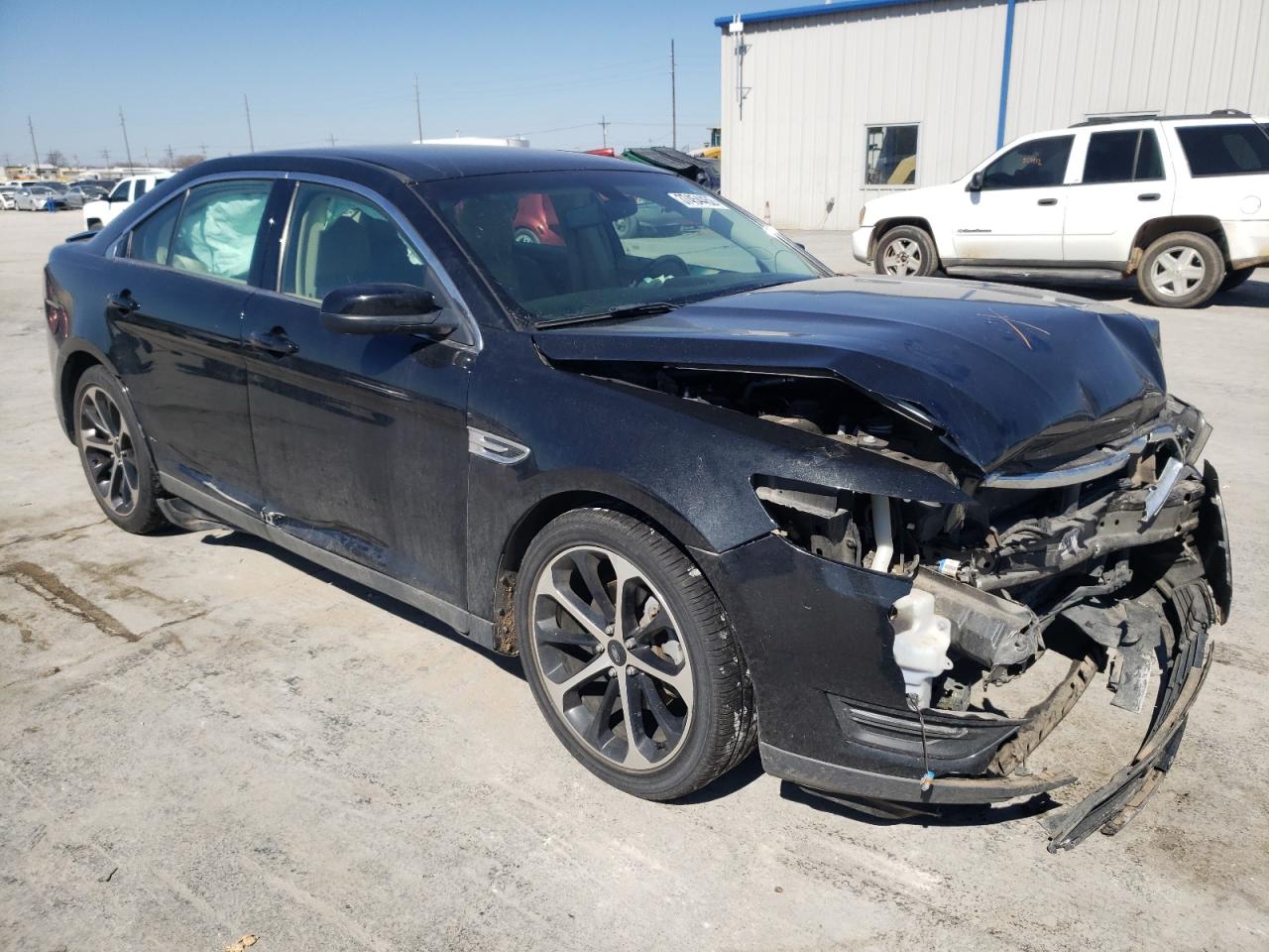 FORD TAURUS SEL 2015 with VIN 1FAHP2E82FG175414 - Photo from auction