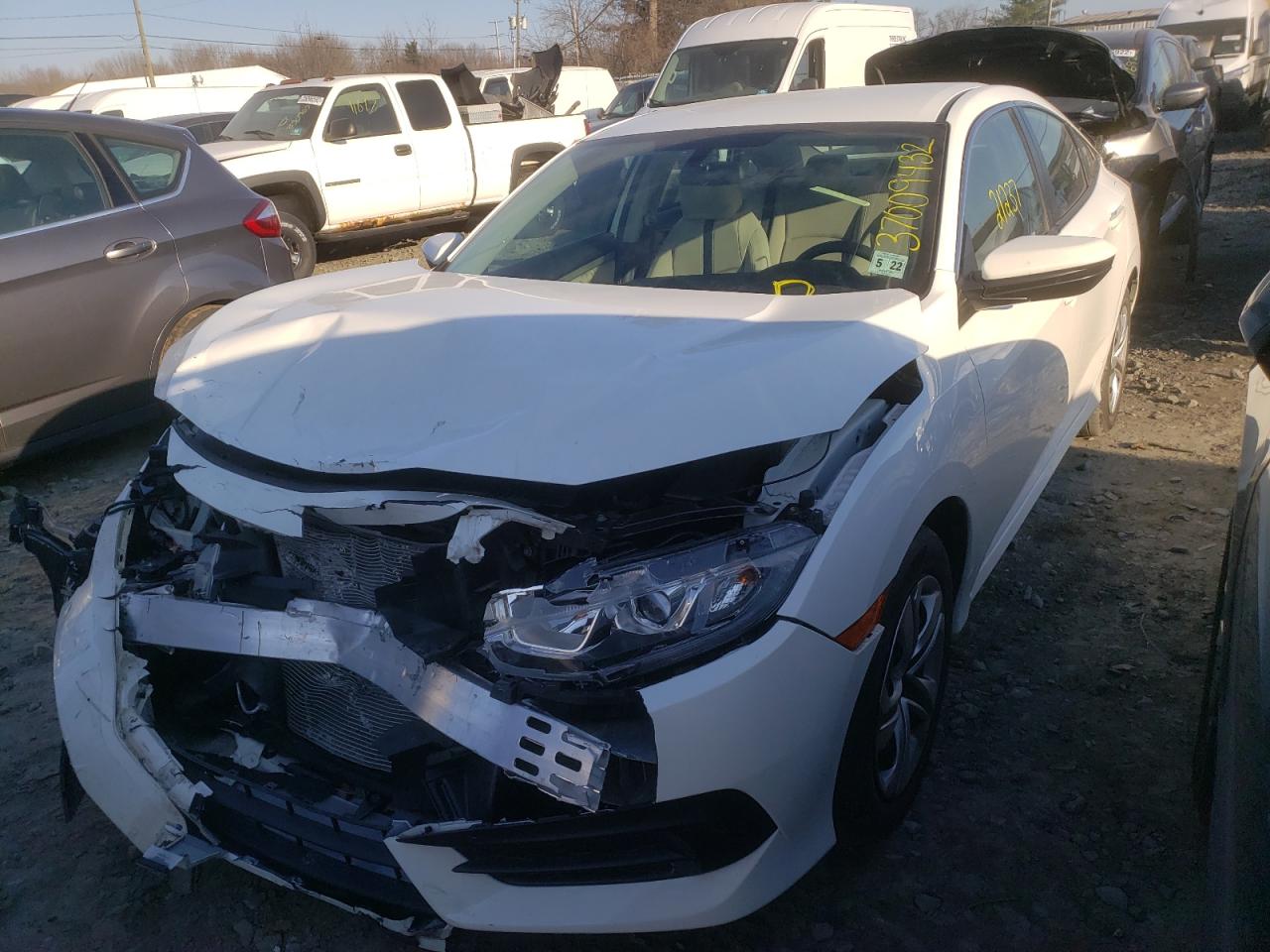 Photo 2 from auction – 2017 HONDA CIVIC LX with VIN 19XFC2F55HE224836