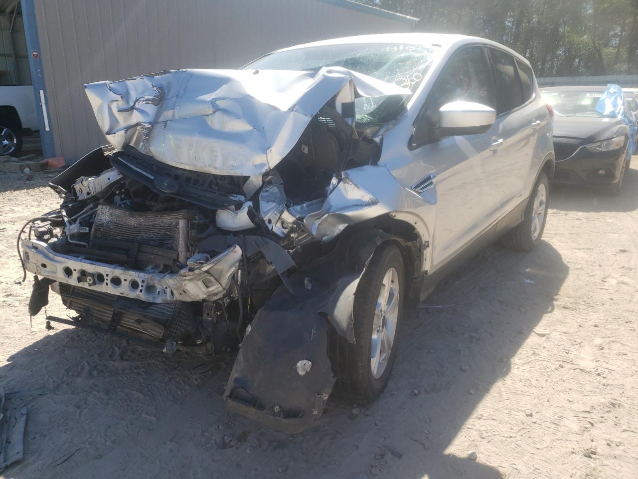 Photo 2 from auction – 2016 FORD ESCAPE SE with VIN 1FMCU0GX6GUB09002