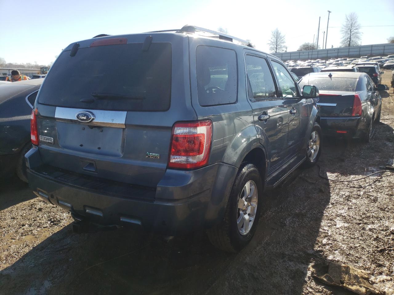 Photo 4 from auction – 2011 FORD ESCAPE LIM with VIN 1FMCU9EG6BKC63107