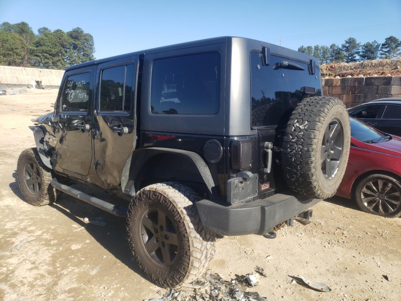Photo 3 from auction – 2011 JEEP WRANGLER U with VIN 1J4BA3H13BL551104