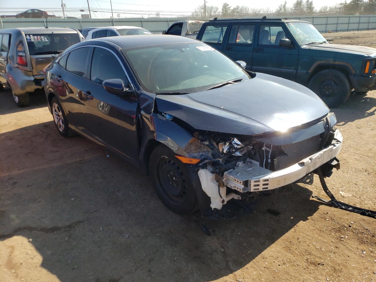 HONDA CIVIC LX 2017 with VIN 19XFC2F5XHE201908 - Photo from auction