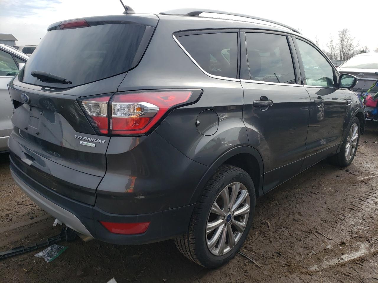Photo 4 from auction – 2018 FORD ESCAPE with VIN 1FMCU0J99JUC32844