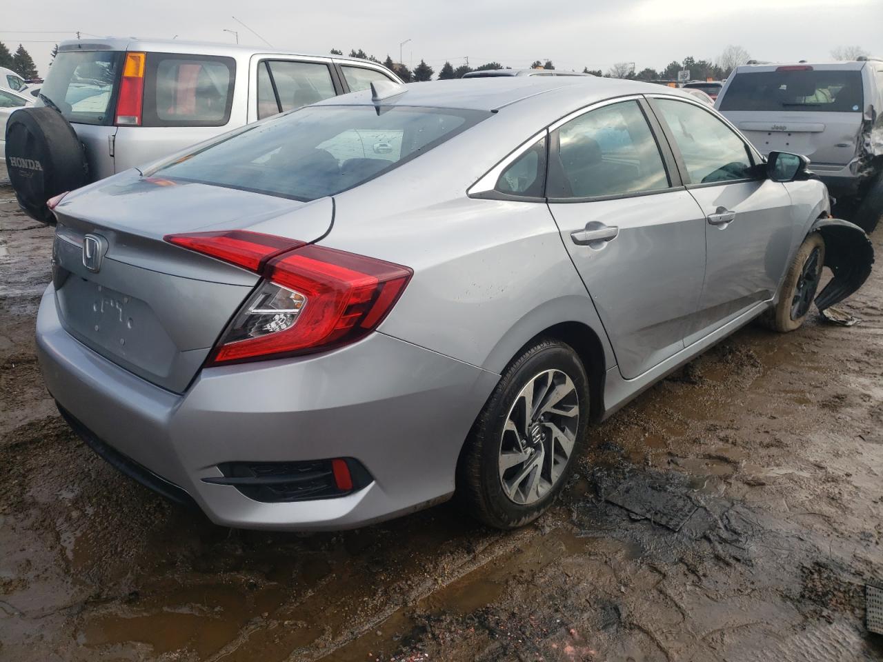 Photo 4 from auction – 2018 HONDA CIVIC EX with VIN 2HGFC2F70JH595156