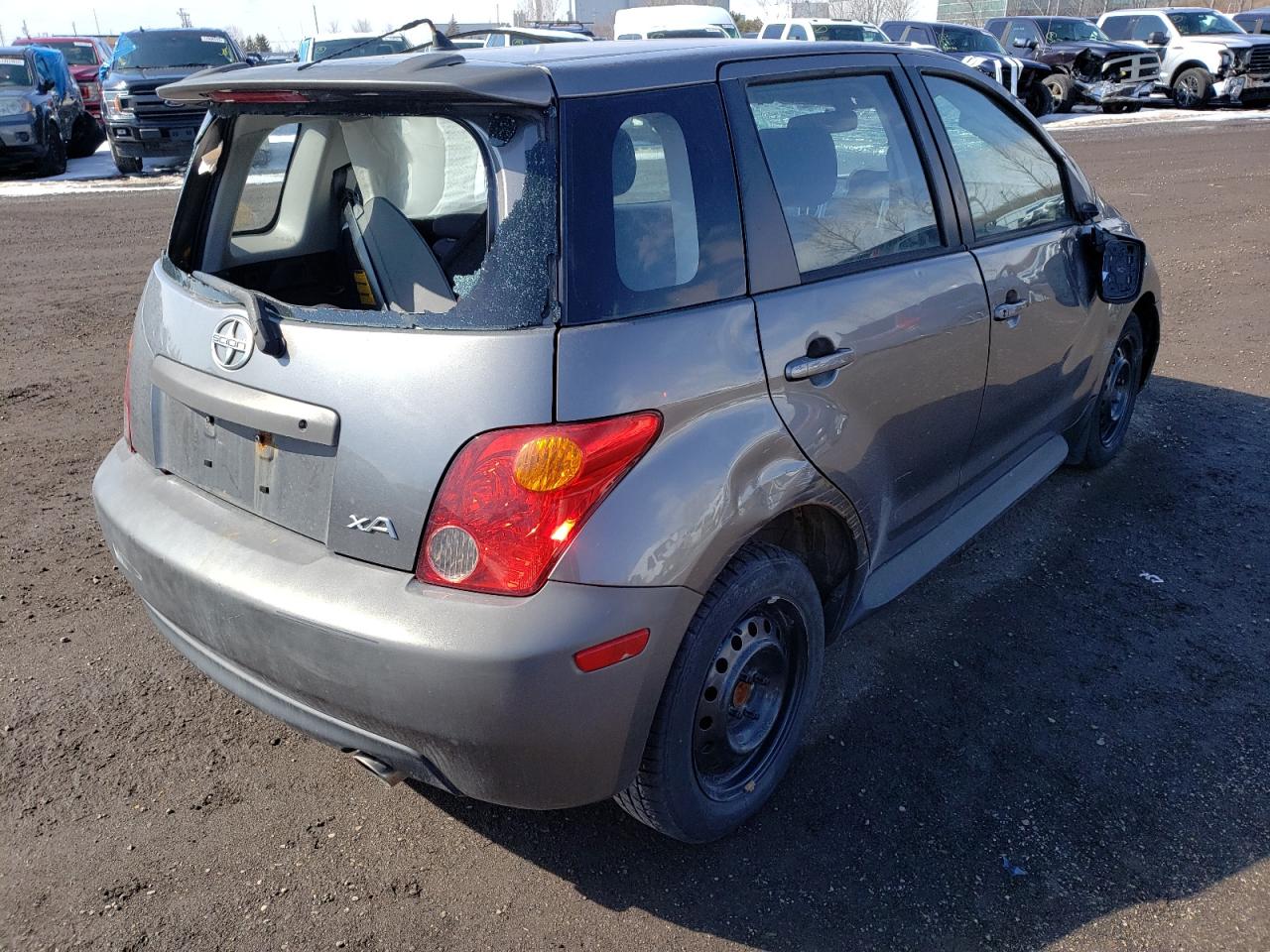 Photo 4 from auction – 2004 TOYOTA SCION XA with VIN JTKKT604040062292