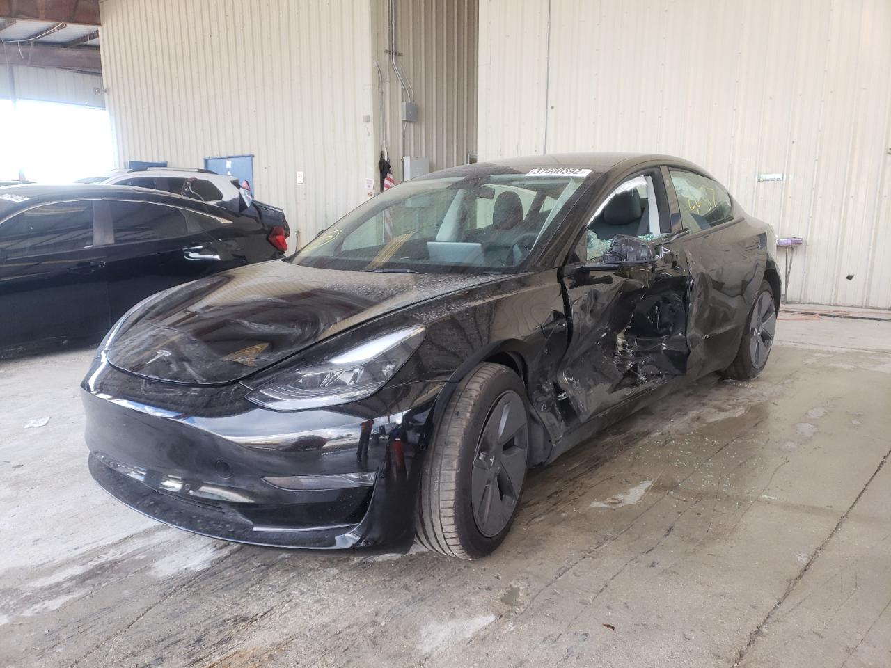 Photo 2 from auction – 2021 TESLA MODEL 3 with VIN 5YJ3E1EA6MF100391
