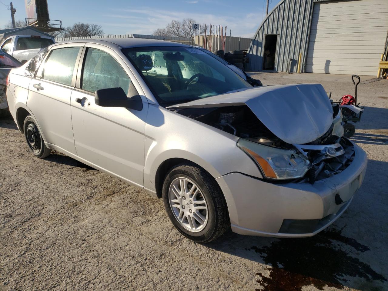 FORD FOCUS SE 2011 with VIN 1FAHP3FN0BW165636 - Photo from auction
