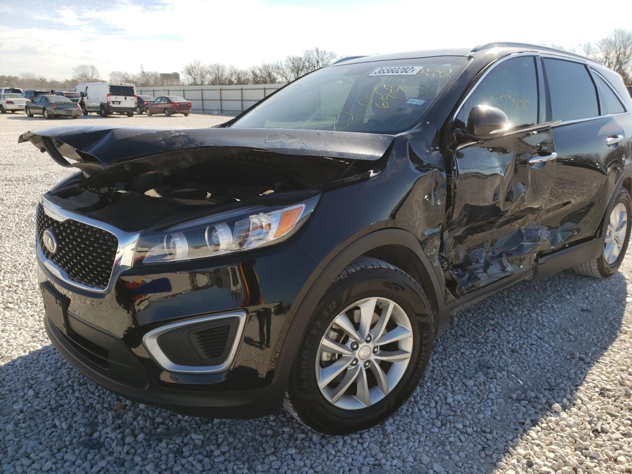 Photo 9 from auction – 2016 KIA SORENTO LX with VIN 5XYPG4A38GG078699