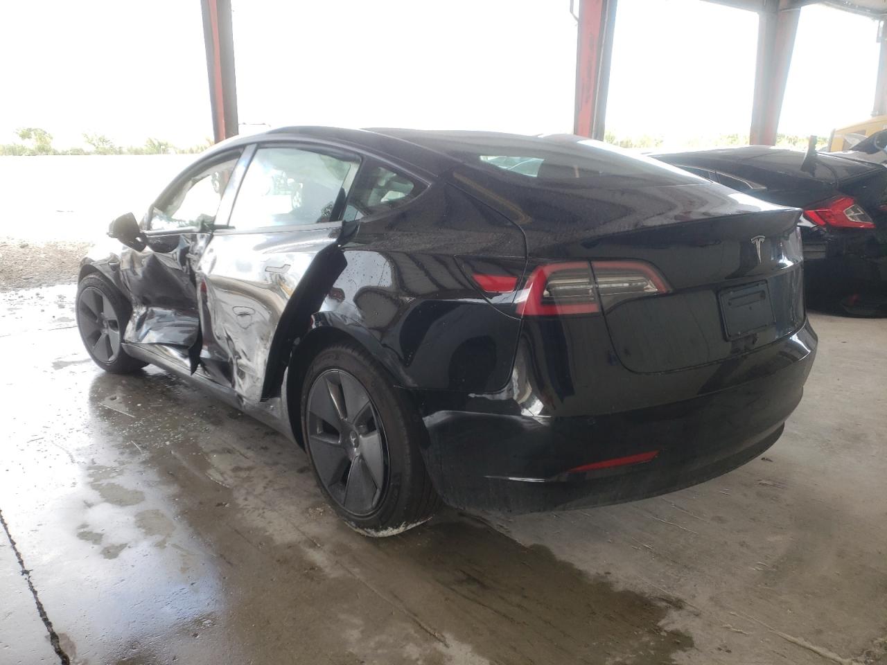 Photo 3 from auction – 2021 TESLA MODEL 3 with VIN 5YJ3E1EA6MF100391