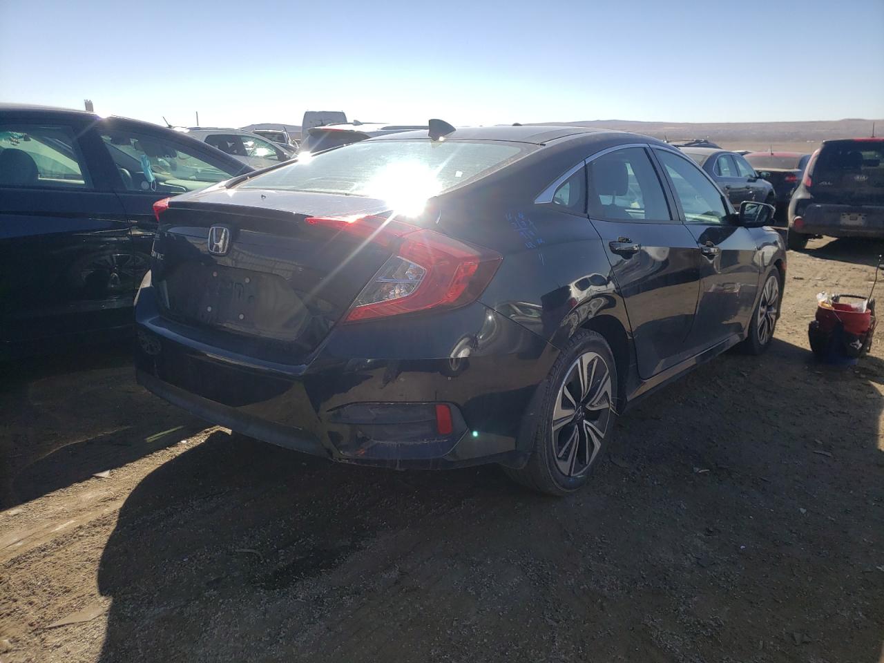 Photo 4 from auction – 2017 HONDA CIVIC EX with VIN 2HGFC1F39HH656117