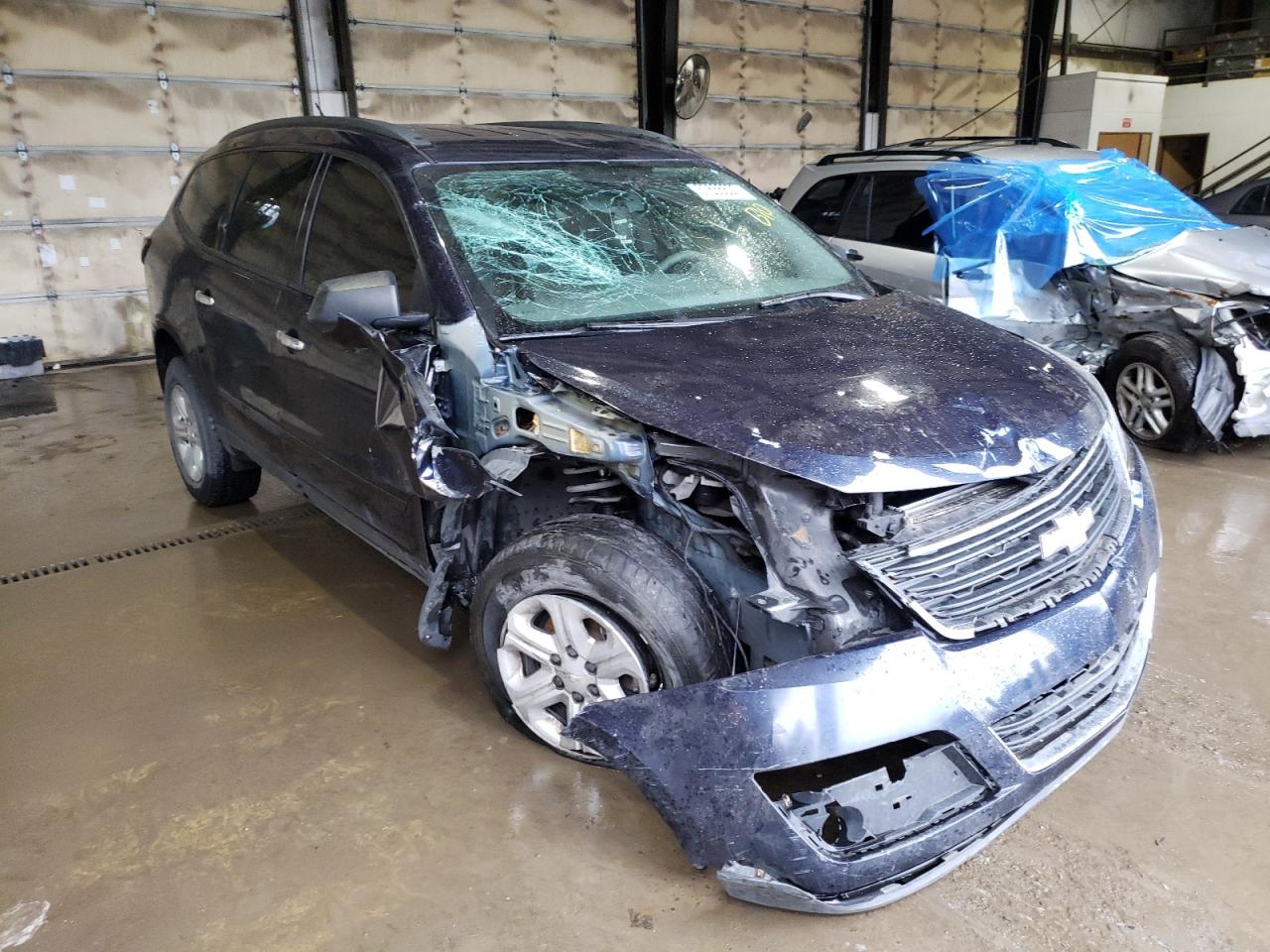 CHEVROLET TRAVERSE L 2015 with VIN 1GNKRFKDXFJ202713 - Photo from auction