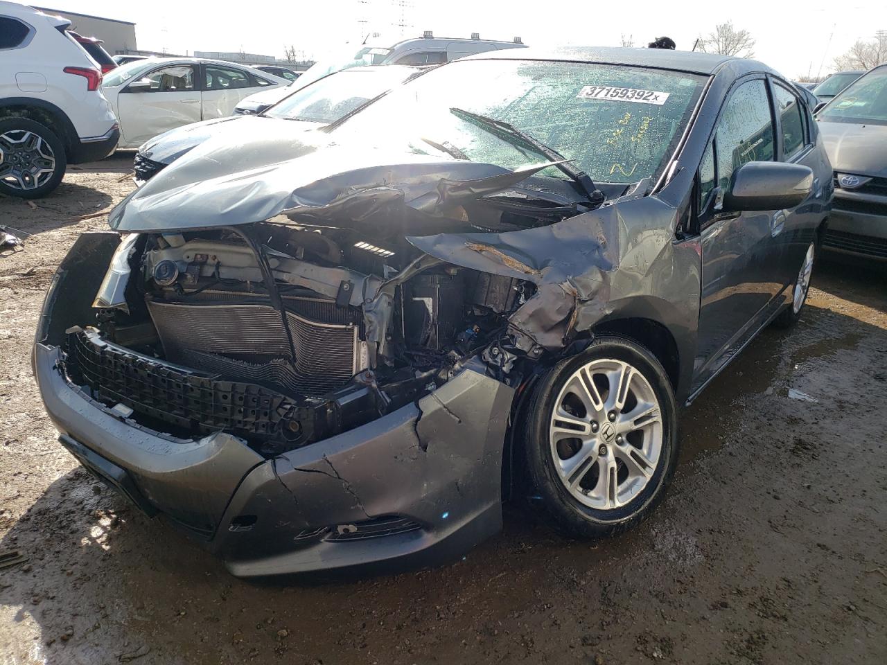 Photo 2 from auction – 2011 HONDA INSIGHT EX with VIN JHMZE2H74BS008730