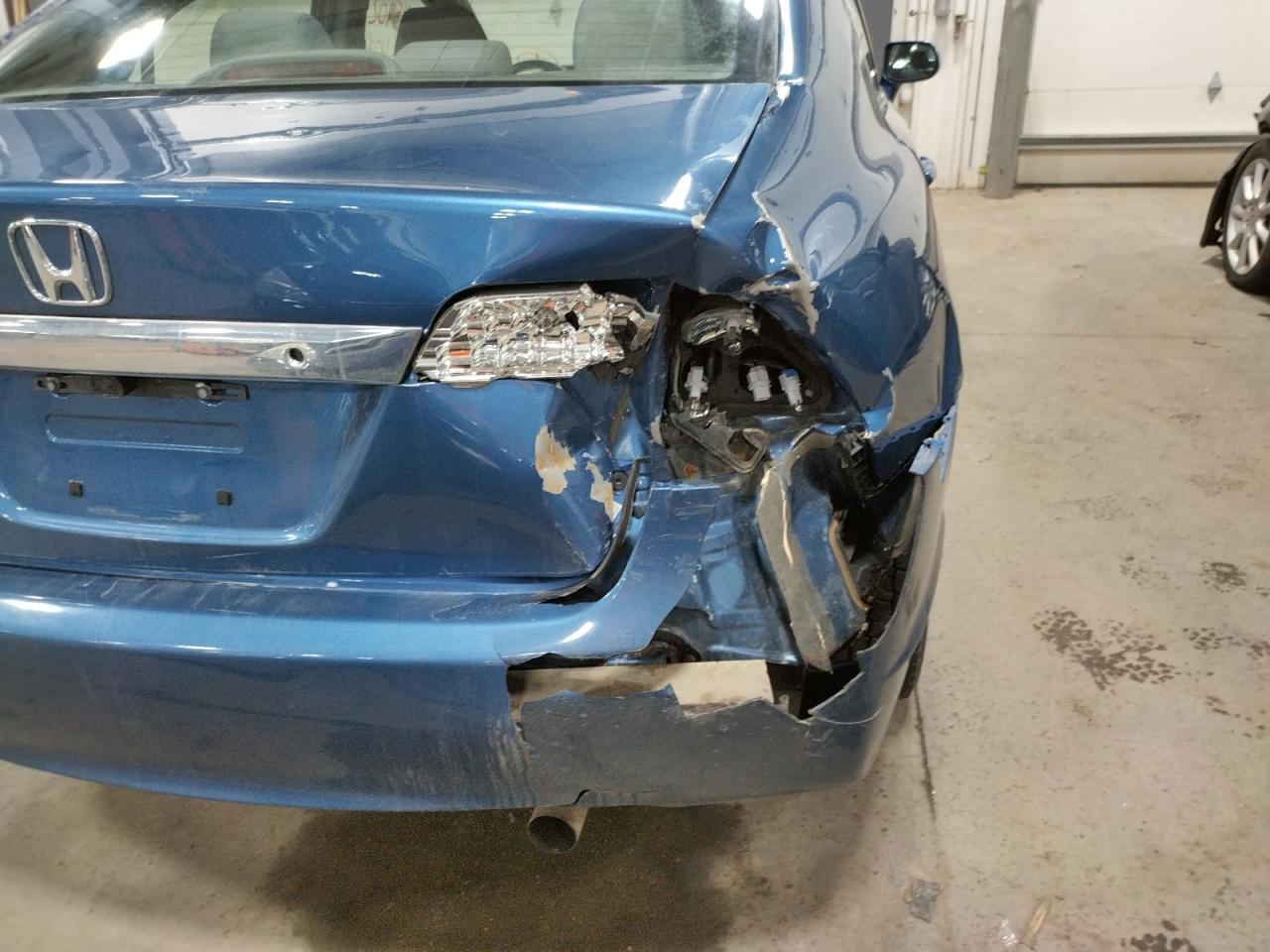 Photo 9 from auction – 2009 HONDA CIVIC LX with VIN 19XFA16549E019123