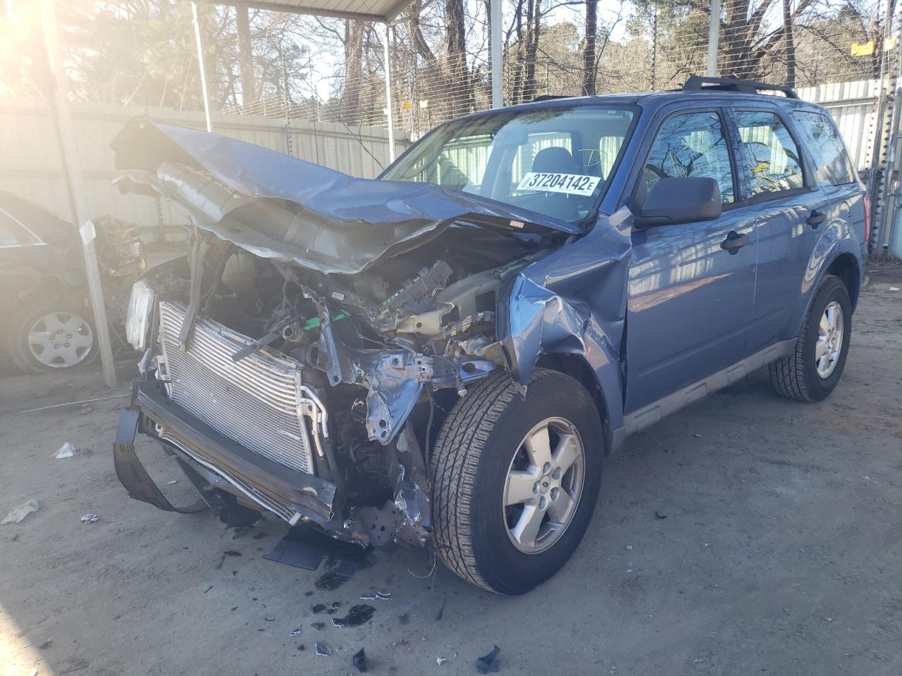 Photo 2 from auction – 2009 FORD ESCAPE XLS with VIN 1FMCU02749KB64697