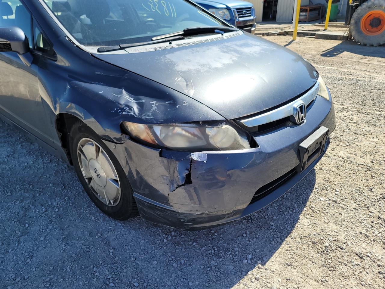 Photo 9 from auction – 2006 HONDA CIVIC HYBR with VIN JHMFA36206S030211