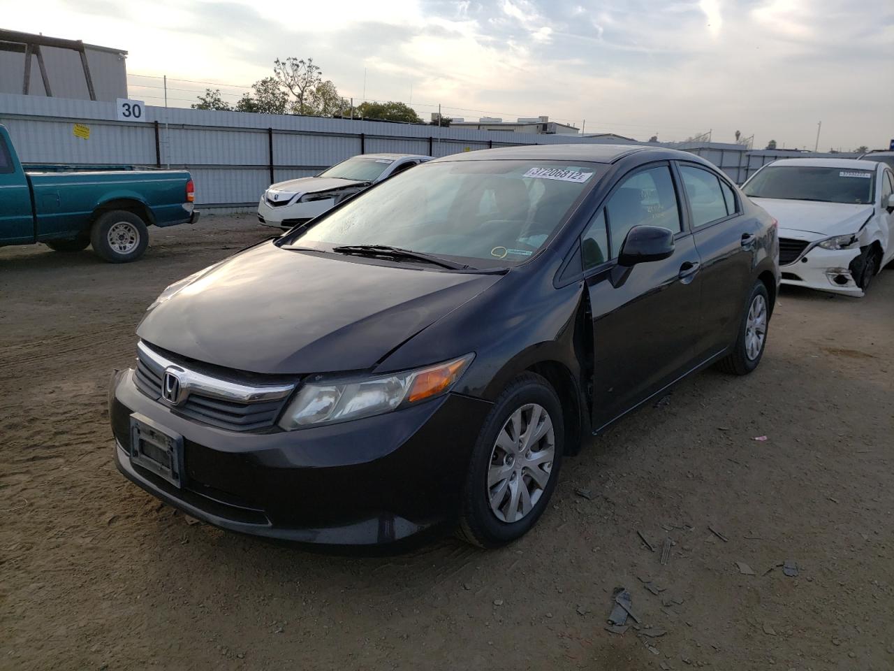 Photo 2 from auction – 2012 HONDA CIVIC LX with VIN 2HGFB2F54CH323858