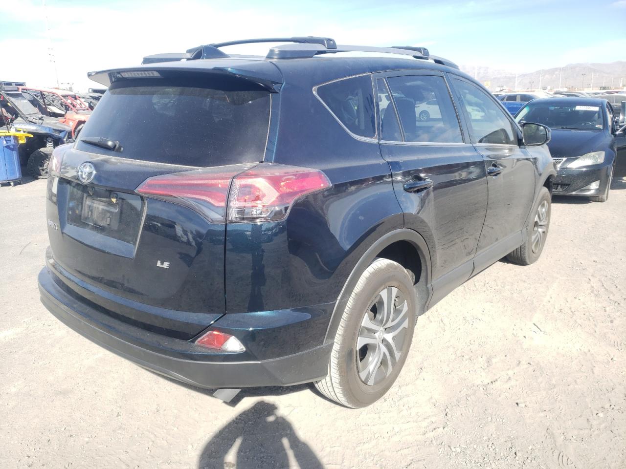 Photo 4 from auction – 2018 TOYOTA RAV4 LE with VIN JTMZFREV2JJ211324