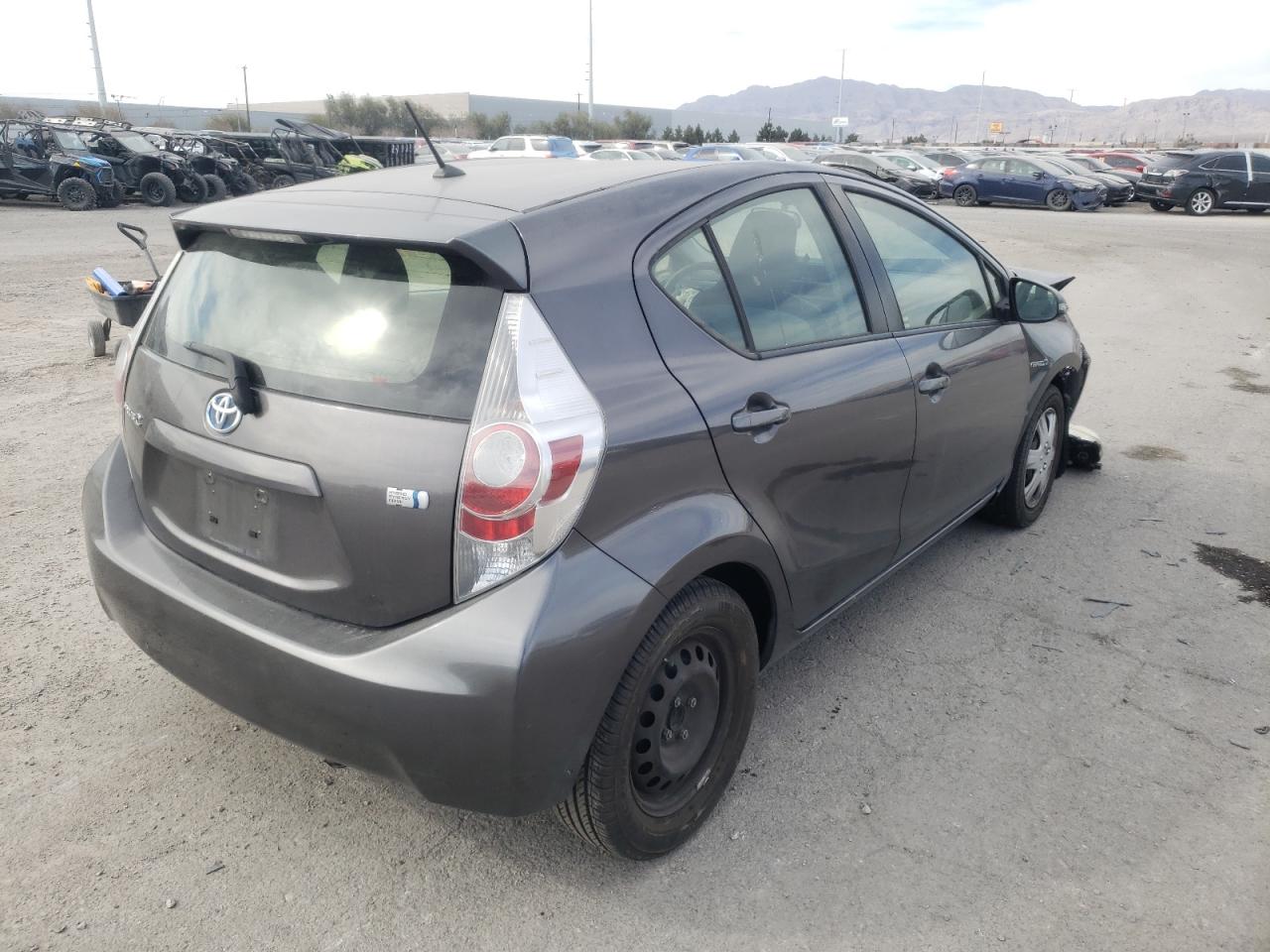 Photo 4 from auction – 2014 TOYOTA PRIUS C with VIN JTDKDTB38E1070532