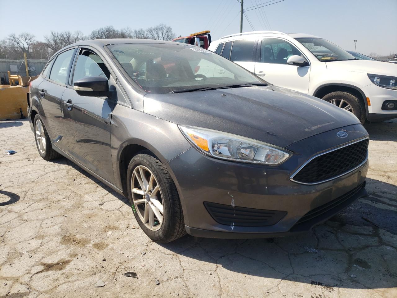 FORD FOCUS SE 2015 with VIN 1FADP3F23FL304413 - Photo from auction