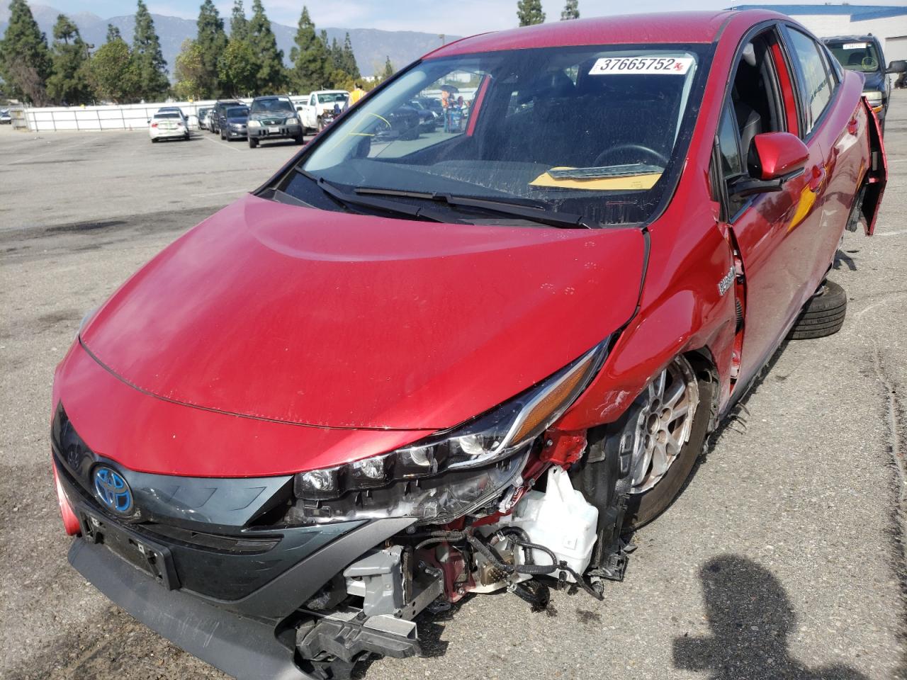 Photo 2 from auction – 2020 TOYOTA PRIUS PRIM with VIN JTDKARFP4L3133684