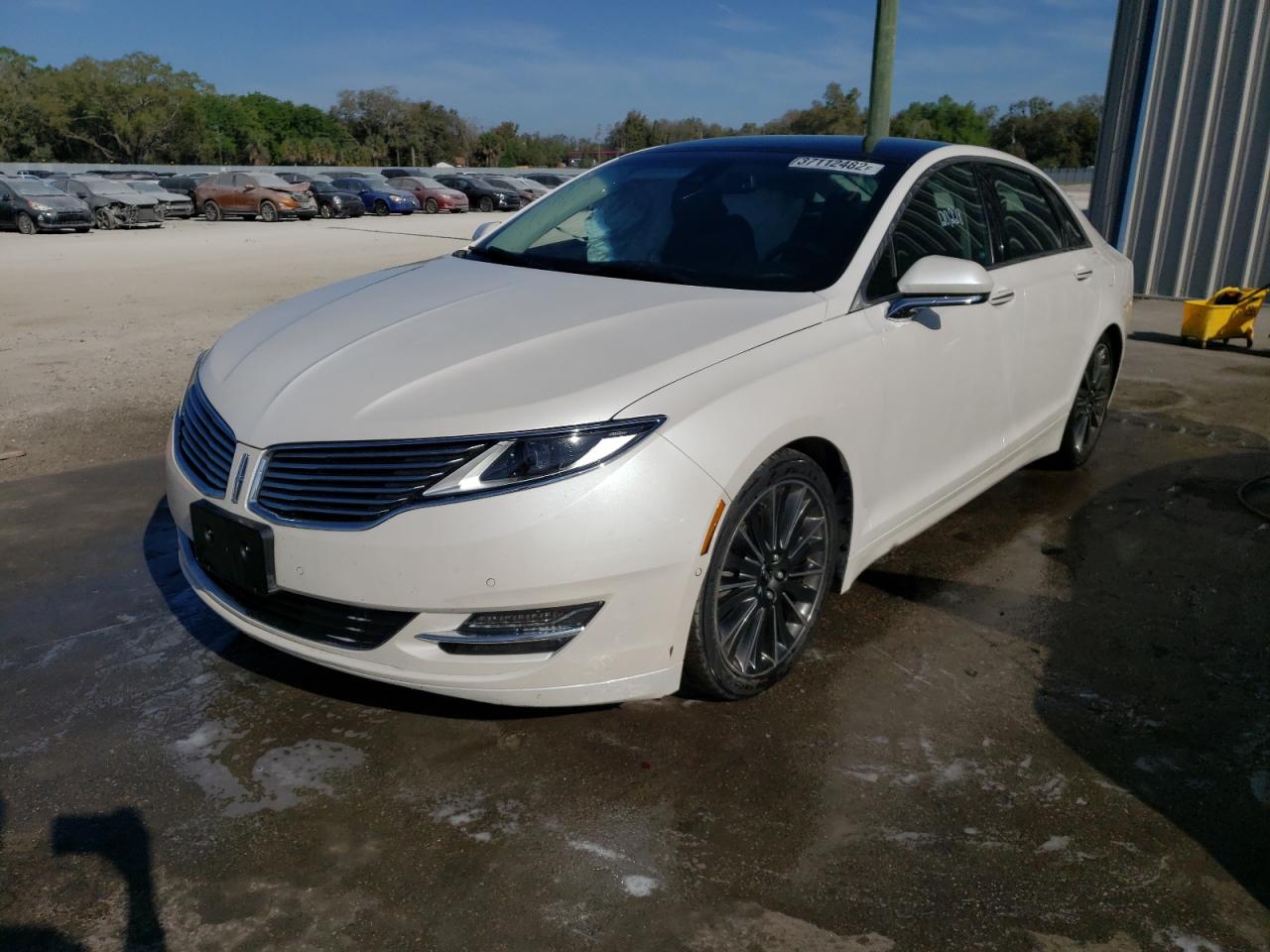 Photo 2 from auction – 2015 LINCOLN MKZ HYBRID with VIN 3LN6L2LU4FR615506