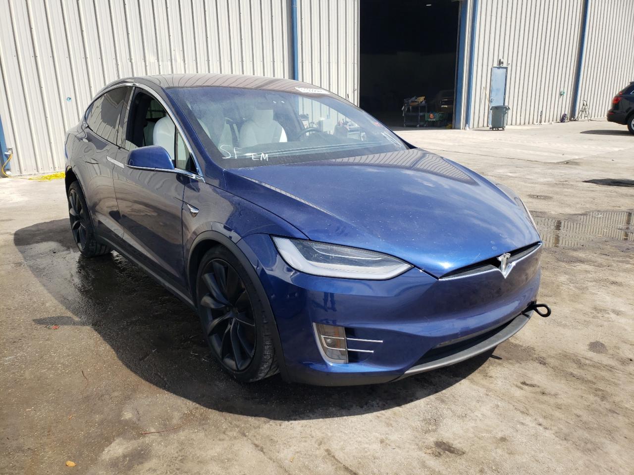 TESLA MODEL X 2021 with VIN 5YJXCDE2XMF322871 - Photo from auction