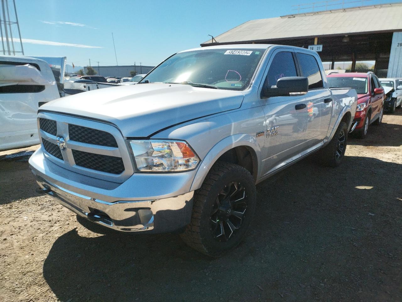 Photo 2 from auction – 2016 RAM 1500 SLT with VIN 1C6RR7LT8GS268635