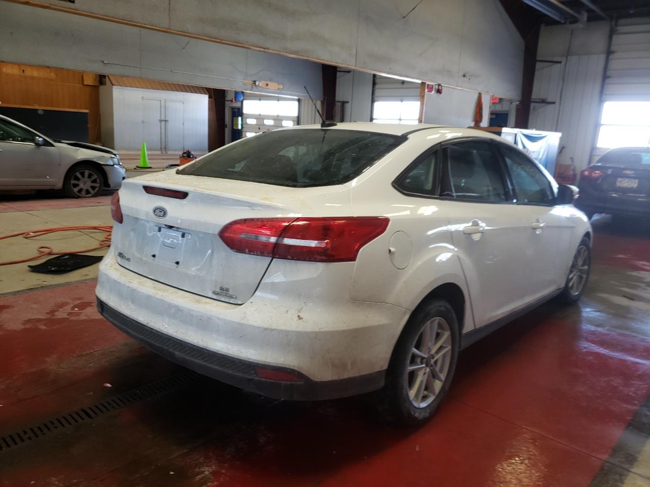Photo 4 from auction – 2016 FORD FOCUS SE with VIN 1FADP3F20GL243636