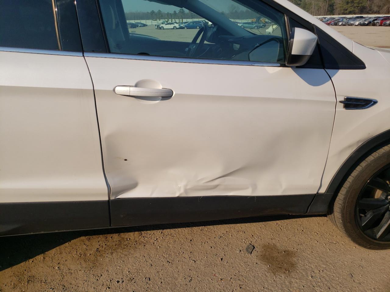 Photo 9 from auction – 2017 FORD ESCAPE SE with VIN 1FMCU0G95HUD34322