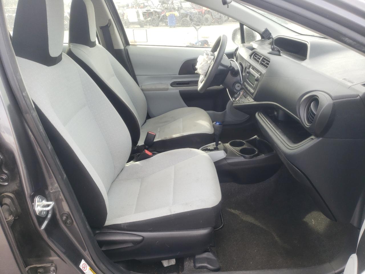 Photo 5 from auction – 2014 TOYOTA PRIUS C with VIN JTDKDTB38E1070532
