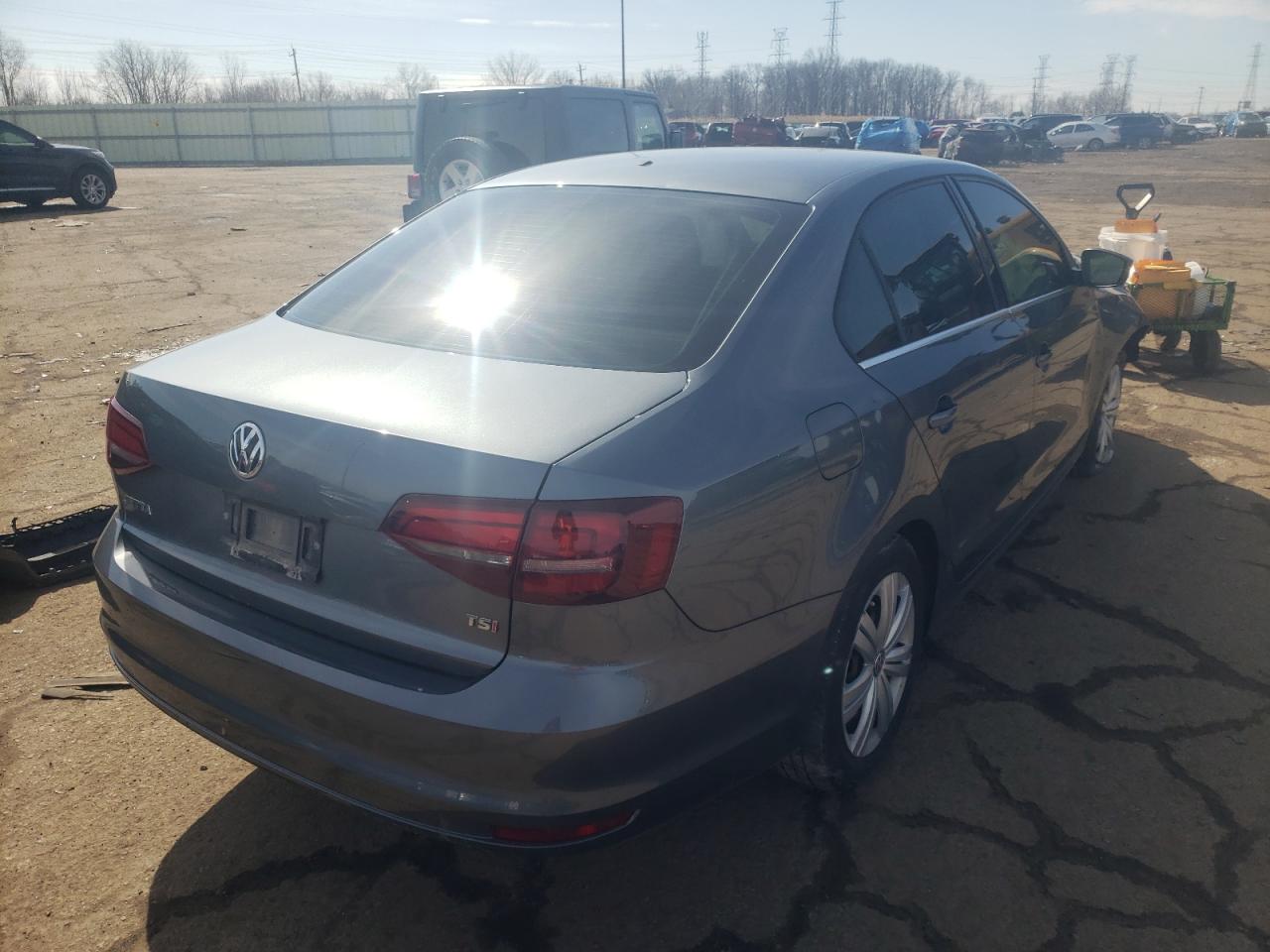 Photo 4 from auction – 2017 VOLKSWAGEN JETTA S with VIN 3VW2B7AJXHM212137