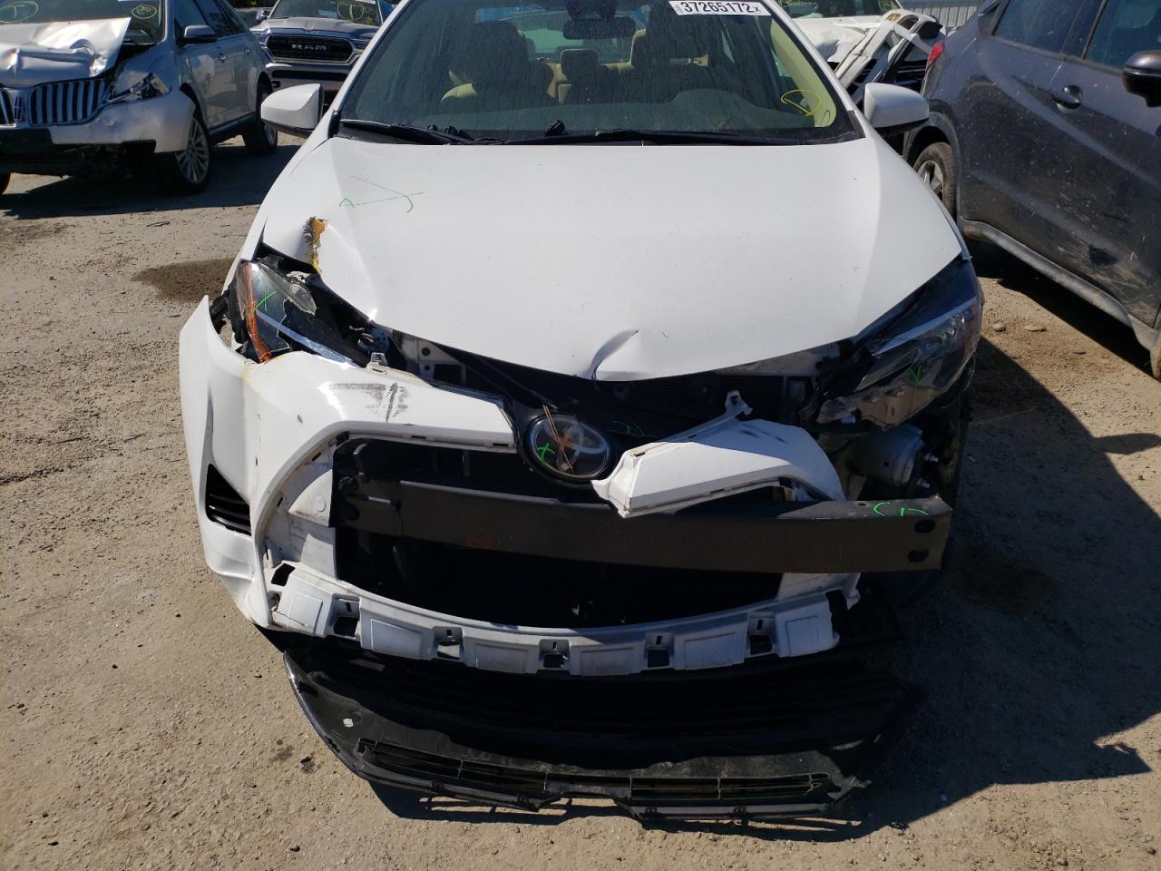 Photo 9 from auction – 2018 TOYOTA COROLLA L with VIN 5YFBURHE9JP747248