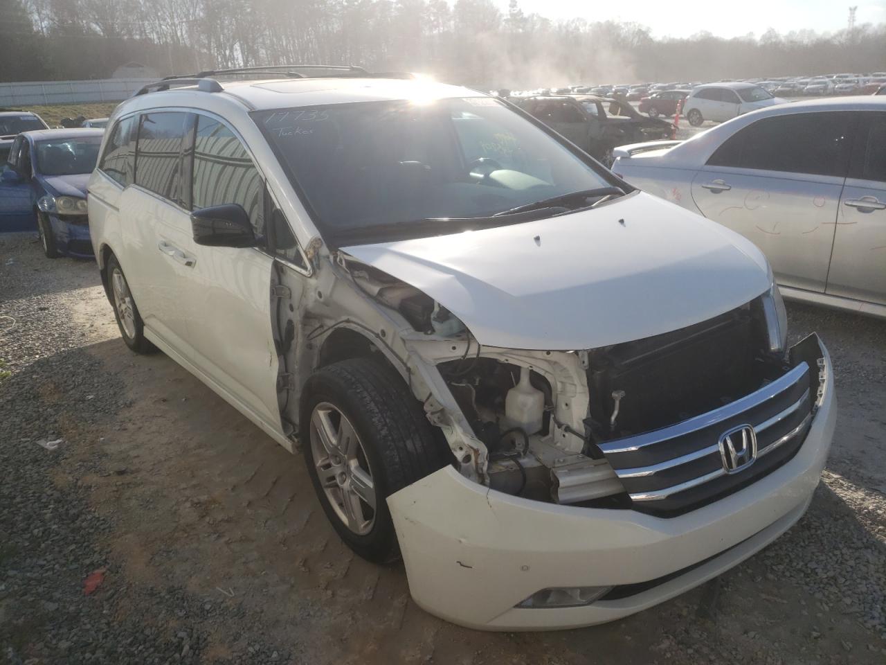 HONDA ODYSSEY 2012 with VIN 5FNRL5H91CB067971 - Photo from auction