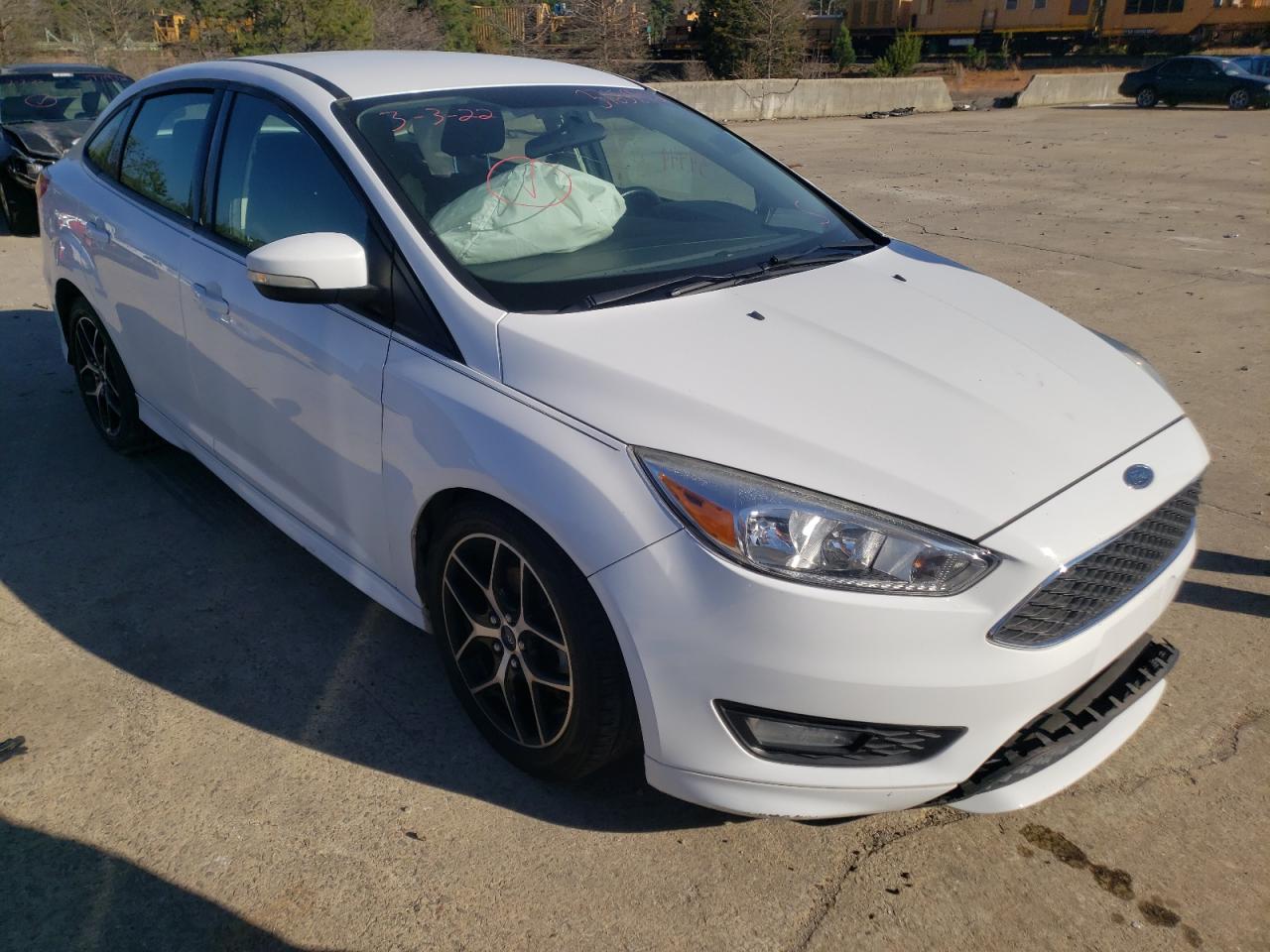 FORD FOCUS SE 2016 with VIN 1FADP3F25GL219722 - Photo from auction