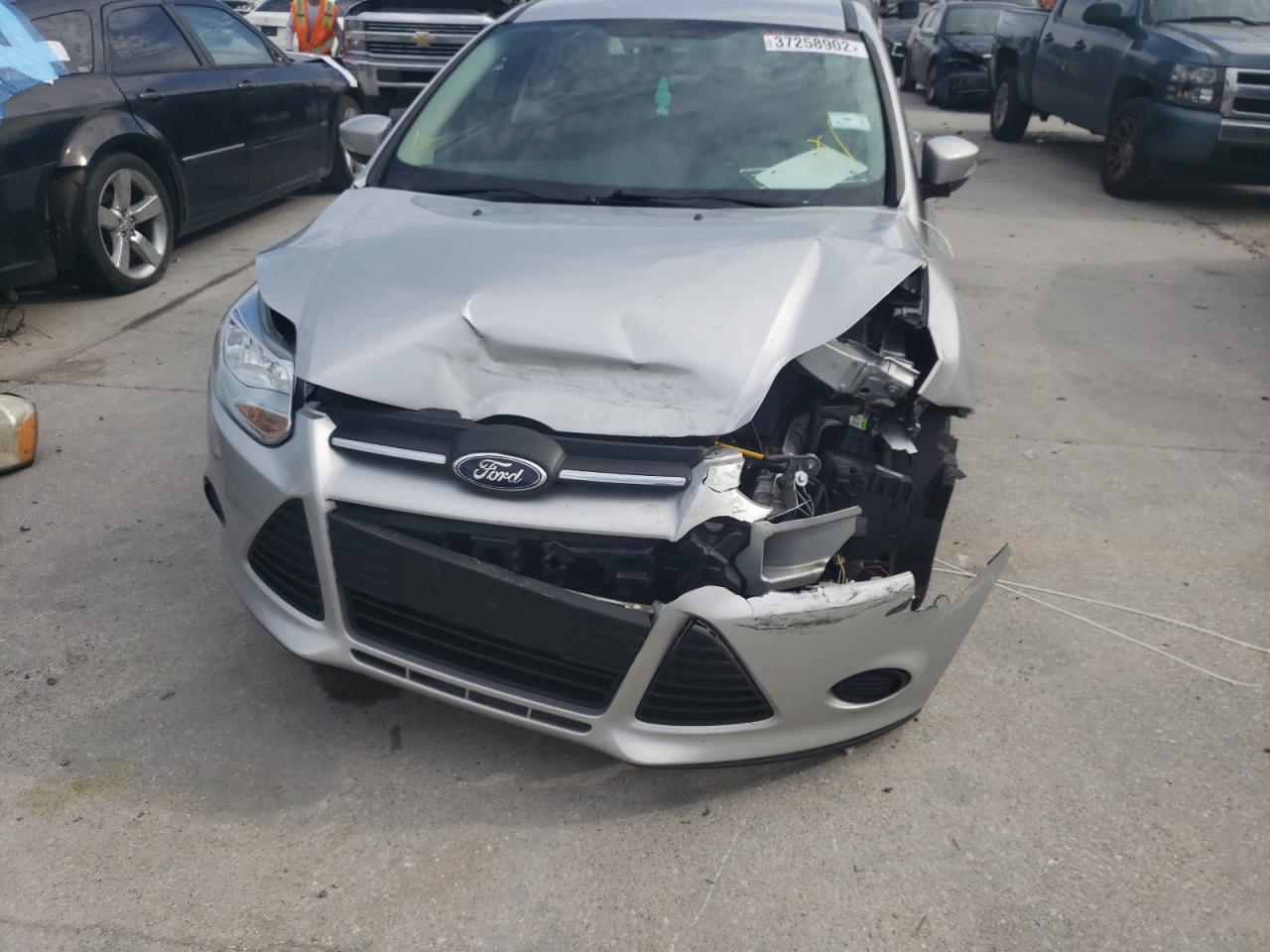 Photo 9 from auction – 2014 FORD FOCUS SE with VIN 1FADP3F20EL141508
