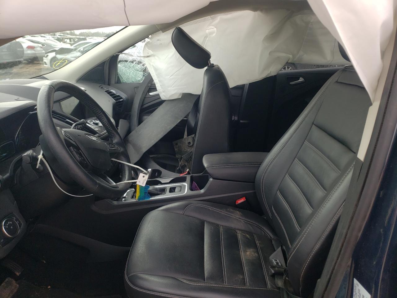 Photo 5 from auction – 2019 FORD ESCAPE TIT with VIN 1FMCU9J99KUC29092