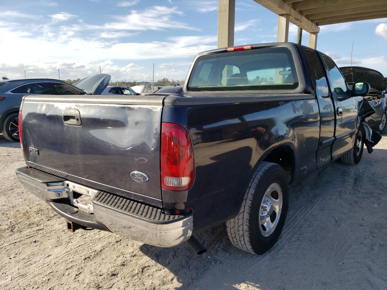 Photo 4 from auction – 1999 FORD F150 with VIN 1FTRX17W8XNC02830