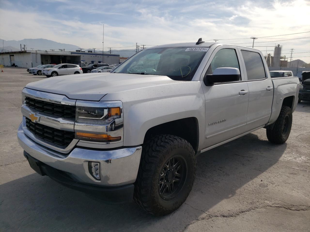 Photo 2 from auction – 2018 CHEVROLET SILVERADO with VIN 3GCPCRECXJG347507