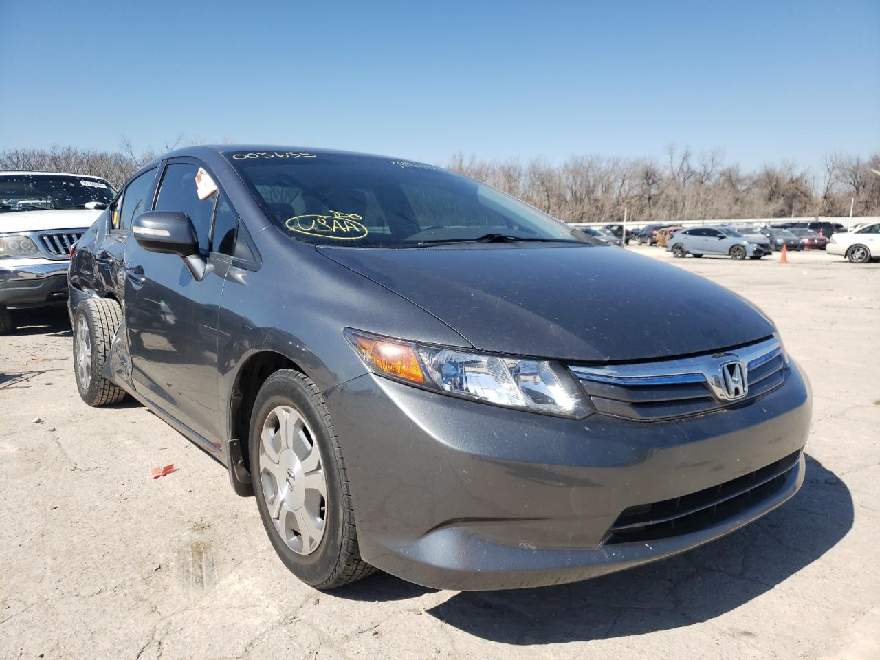 HONDA CIVIC HYBR 2012 with VIN JHMFB4F36CS003635 - Photo from auction