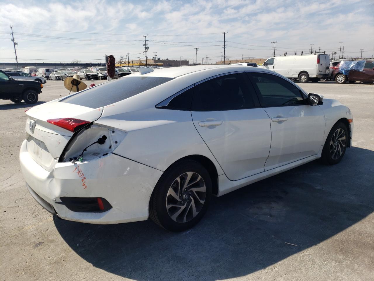 Photo 4 from auction – 2017 HONDA CIVIC EX with VIN 2HGFC2F75HH574507