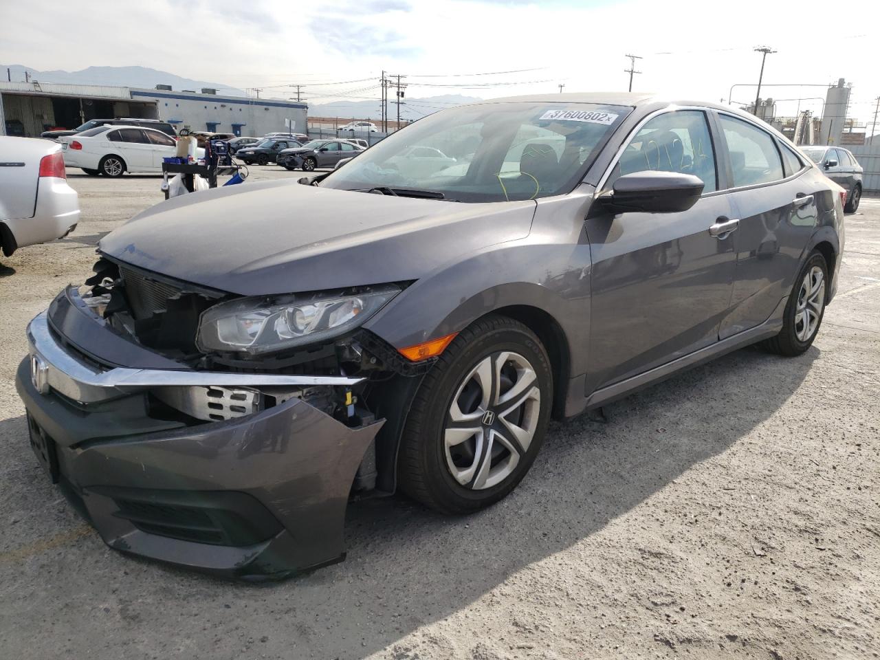 Photo 2 from auction – 2016 HONDA CIVIC LX with VIN 19XFC2F53GE067239