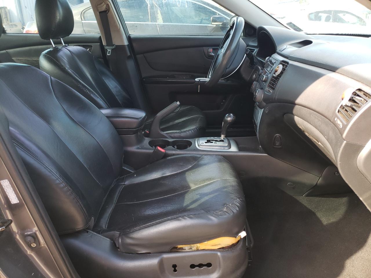 Photo 5 from auction – 2007 KIA OPTIMA LX with VIN KNAGE124X75094954