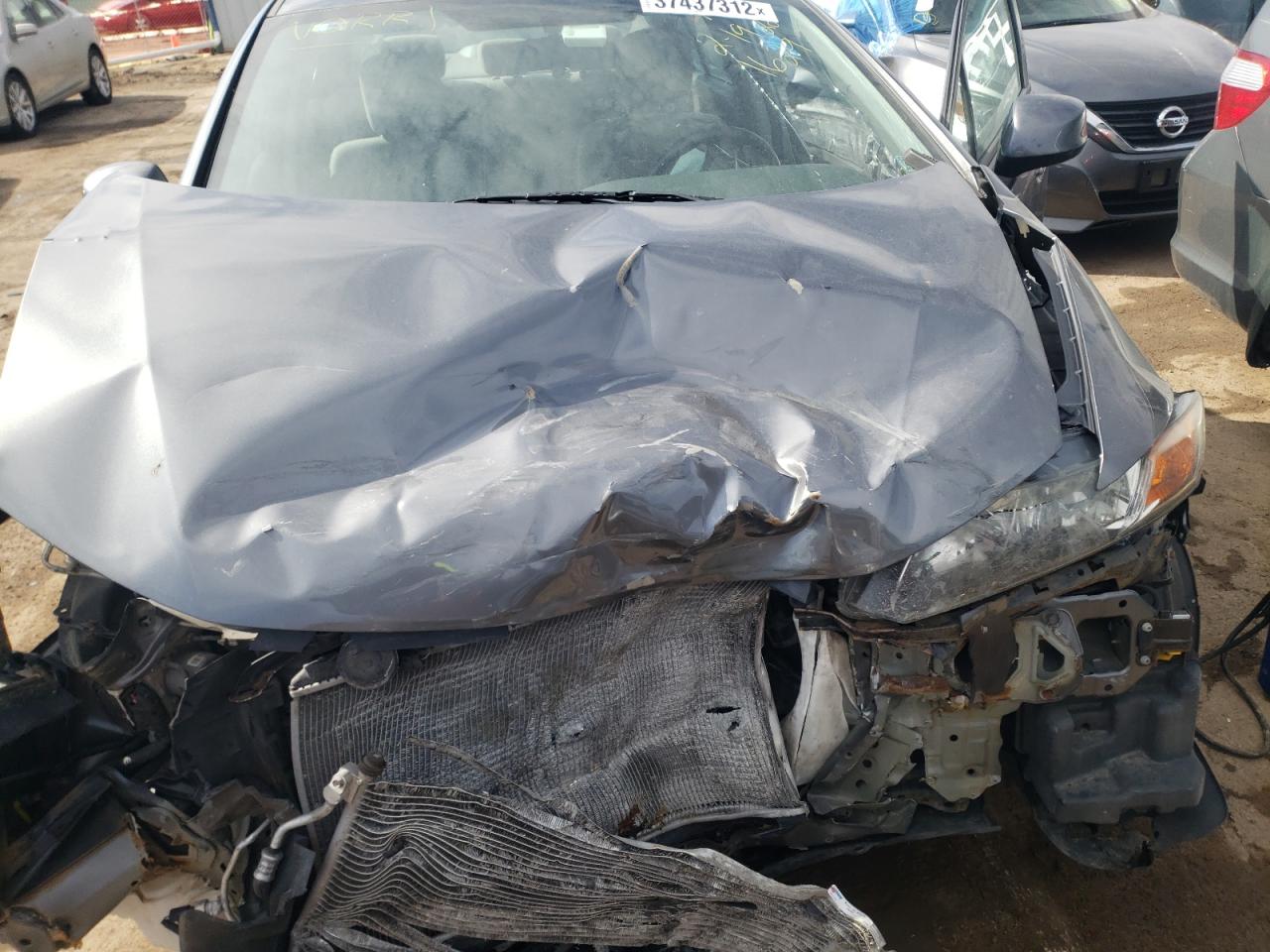 Photo 7 from auction – 2012 HONDA CIVIC LX with VIN 19XFB2F55CE101629