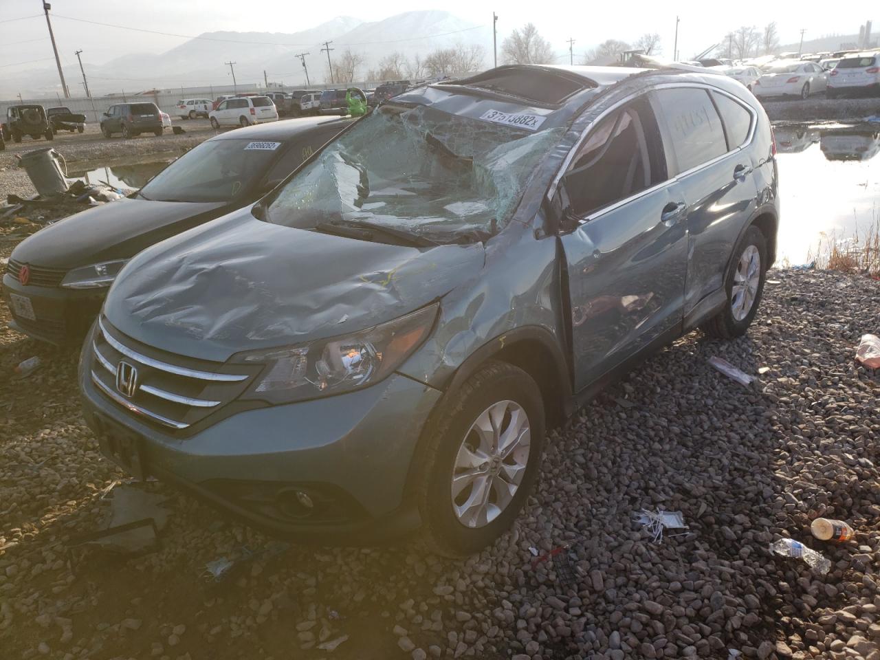 Photo 2 from auction – 2014 HONDA CR-V EXL with VIN 2HKRM4H74EH670908