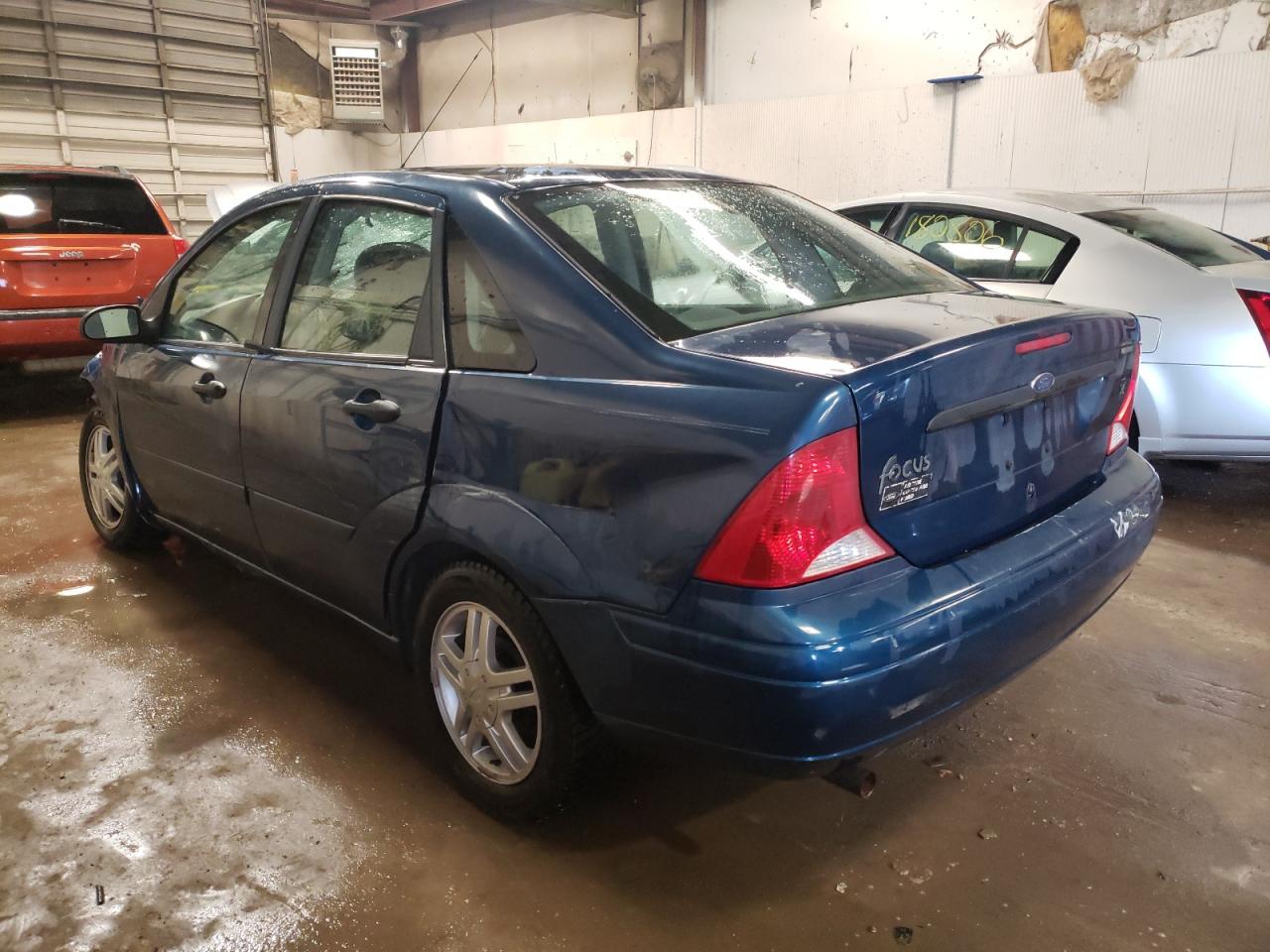 Photo 3 from auction – 2000 FORD FOCUS SE with VIN 1FAFP34P4YW419823