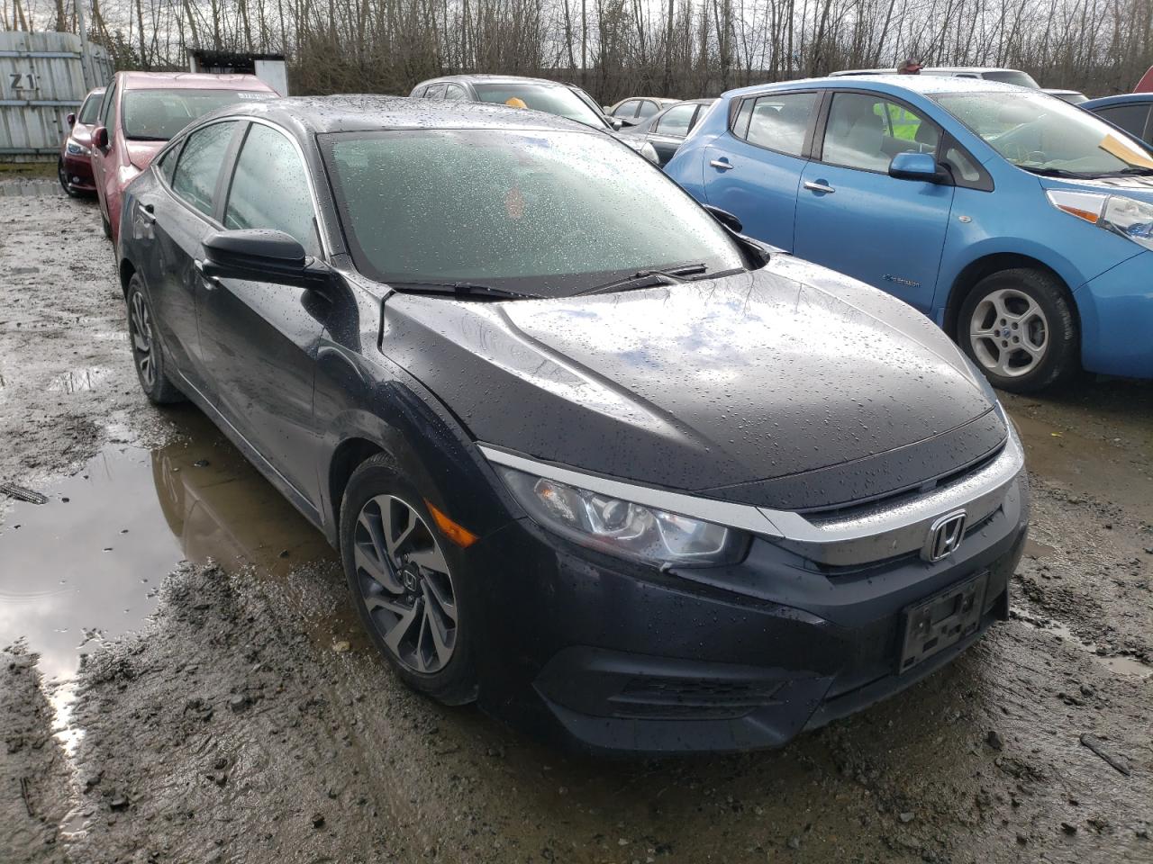 HONDA CIVIC EX 2016 with VIN 2HGFC2F74GH518976 - Photo from auction